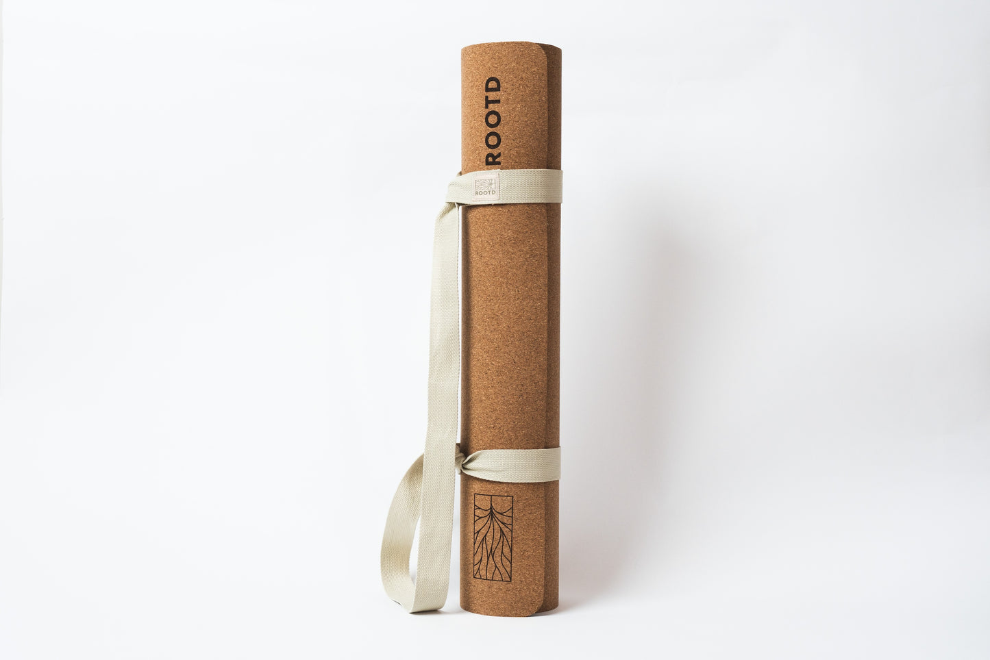 ROOTD Elite Bare Design. Non-toxic eco cork exercise mat with a plain minimal design. Rolled up with a white cotton carry strap. 